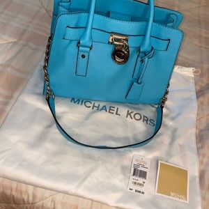Turquoise Michael Kors purse like new